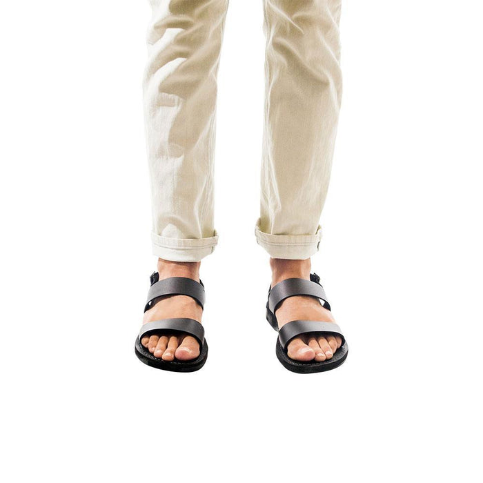 Model wearing Golan black, handmade leather sandals with back strap
