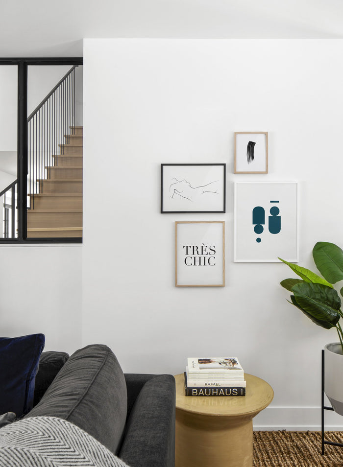 minimalist art print by Opposite Wall with trendy design of Near symmetry in dark indigo - Living room with a gallery wall quadruple