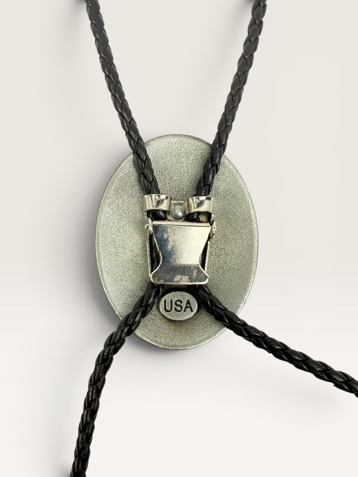 Silver “M” Bolo Tie