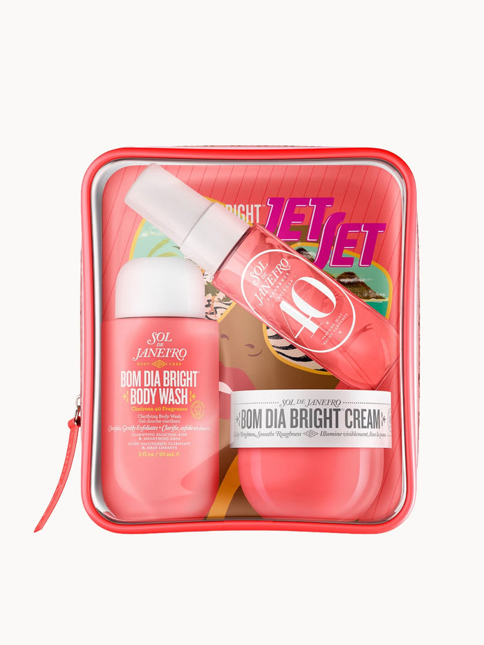 Sol de Janeiro Bom Dia Jet Set bath and body product set with colorful packaging and skincare bottles on a white background.