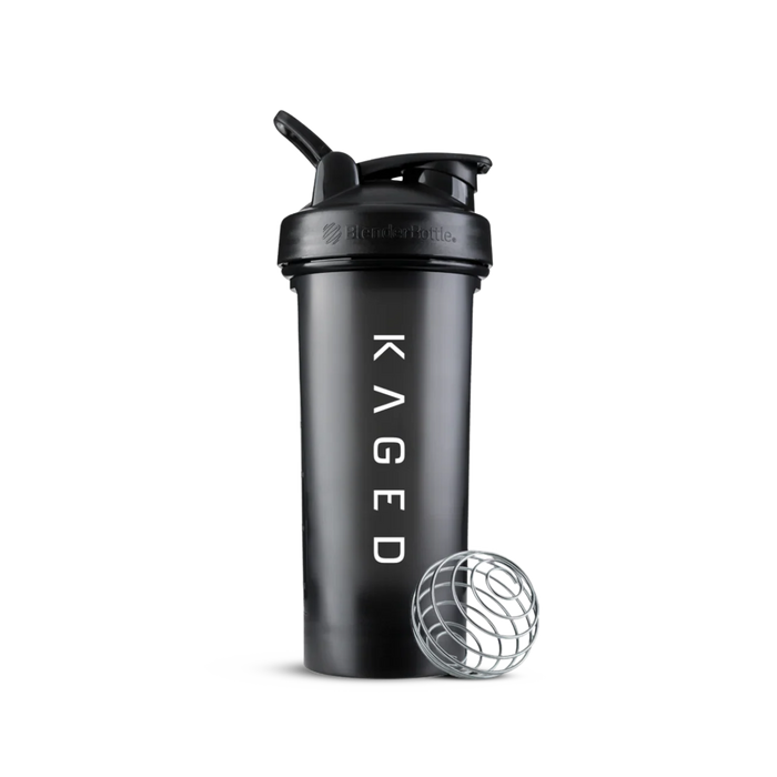 Front view of Blender Bottle Classic 28 oz showing SpoutGuard lid, KAGED logo, carry loop, and BlenderBall whisk on white
