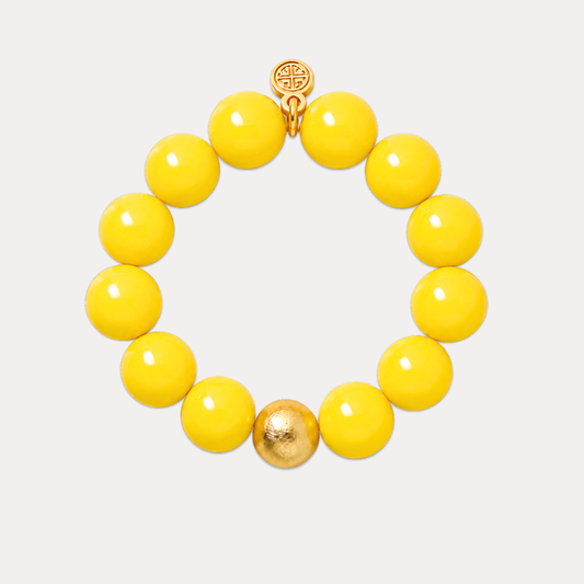 a yellow beaded bracelet