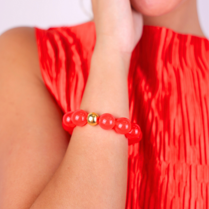 a woman wearing a red dress