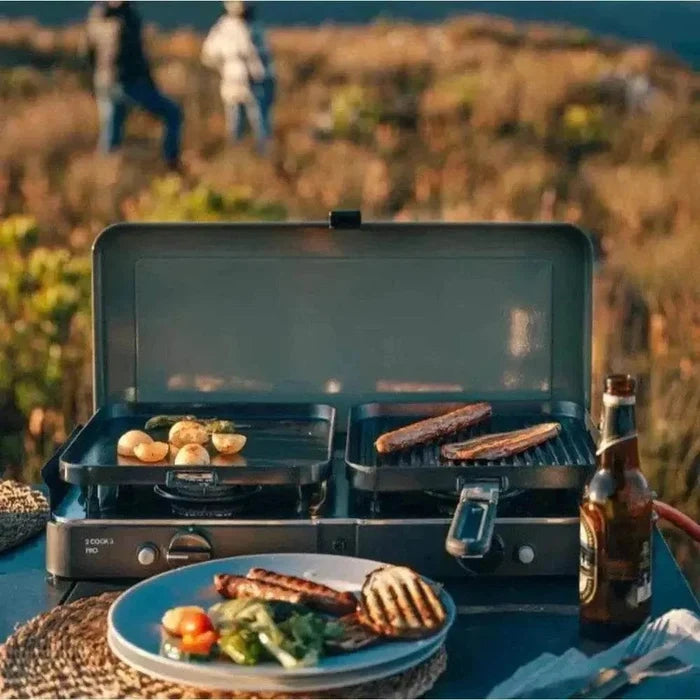 Portable CADAC 2 Cook 3 Pro gas barbecue with dual burners and flat and ribbed GreenGrill plates for versatile outdoor cooking