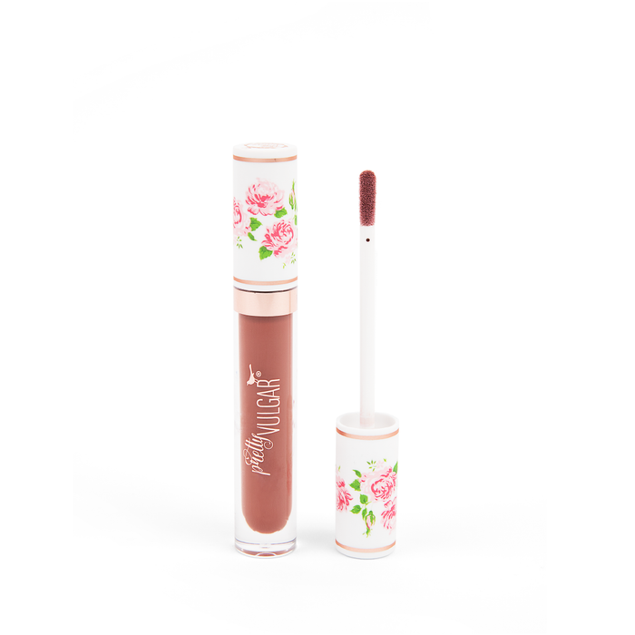 Tube of CEO of Lip Gloss | Pretty Vulgar lip gloss in a warm mauve shade with floral design on the cap and applicator wand showing product texture.