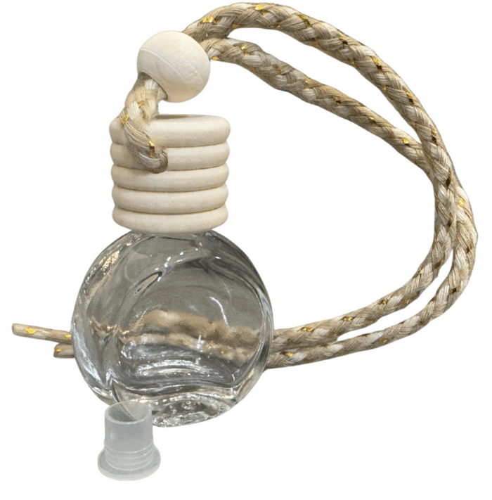 Clear glass car diffuser bottle with wood cap and braided beige and brown rope on a white background