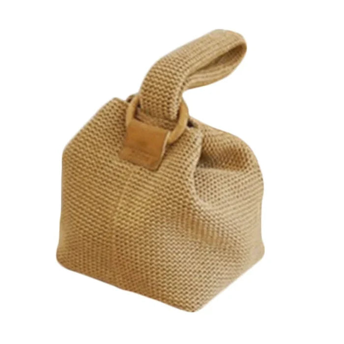 Grace Beauty straw handbag with top handle, summer women's beach bag featuring woven rattan material and compact design.