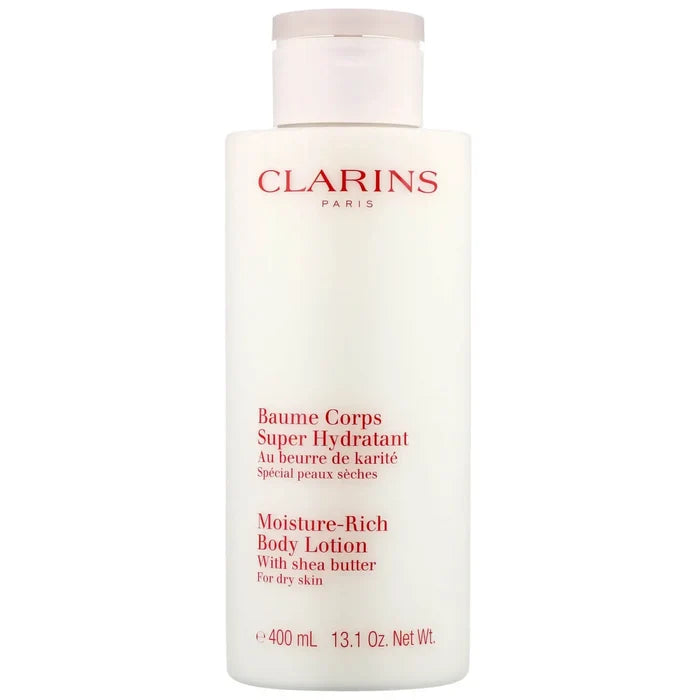 Clarins Moisture-Rich Body Lotion with Shea Butter for dry skin, 400ml bottle showing creamy lotion texture and branding.