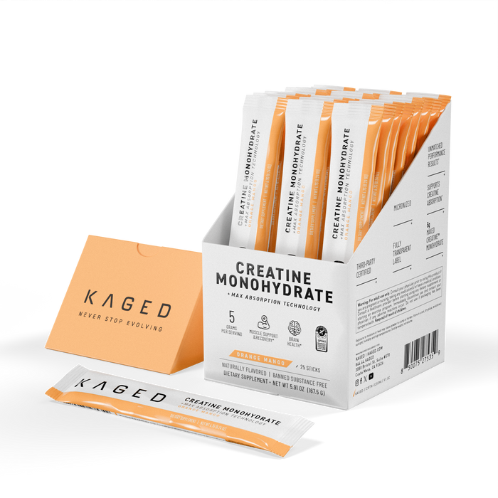 Angled front view of Creatine Monohydrate stick-pack box showing orange mango packets and one sachet on black background #flavor_orange mango