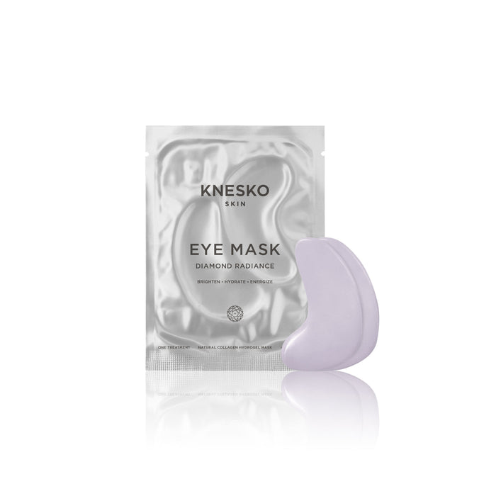 Diamond Radiance Eye Mask - Single | Knesko shown with light purple curved skincare recovery tool next to silver reflective eye mask packaging for hydration and brightening.