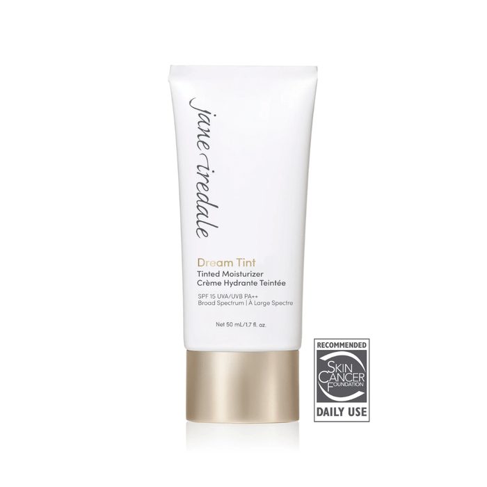 Packaged tube of Dream Tine Tinted Moisturizer SPF 15 | Jane Iredale featuring broad spectrum sun protection and a gold-toned cap, ideal for daily skincare use.
