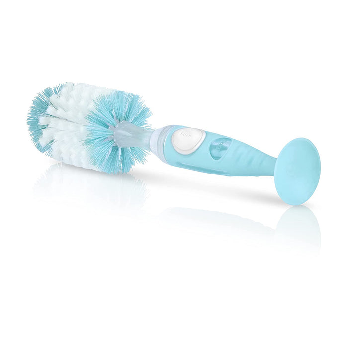 The Easy Clean Soap Dispensing Brush with Suction Base features stiff bristles, a contoured handle, and a blue and white design, shown on a white reflective surface.