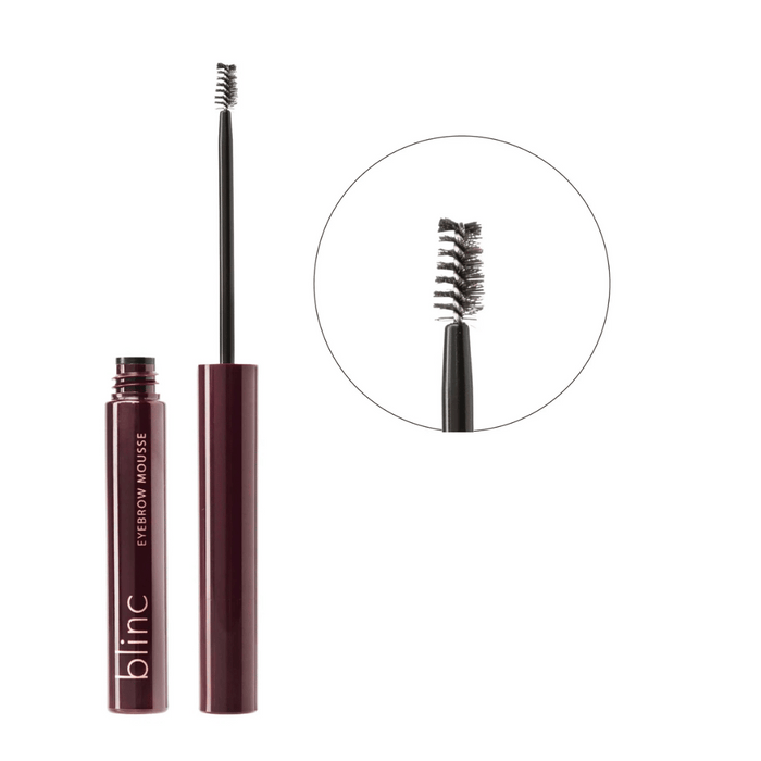 Eyebrow Mousse | Blinc in a dark maroon tube with a spoolie brush applicator designed for precise eyebrow grooming and shaping.