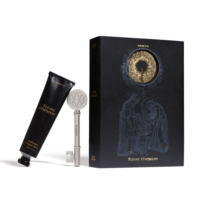 Flying Ointment with skeleton key next to the Flying Ointment book by Heretic.
