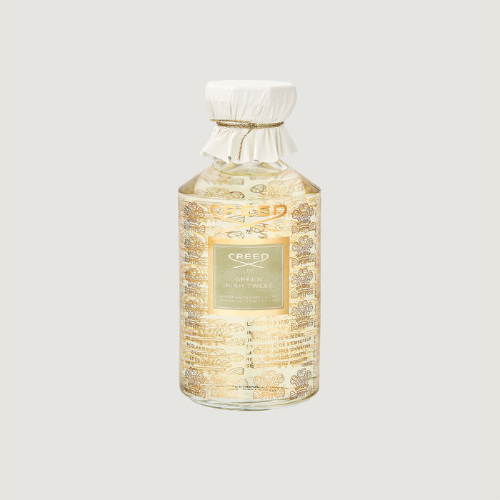 Creed Green Irish Tweed 490ml grand flacon with gold botanical print and white leather cap - Angle View | Creed Fragrances