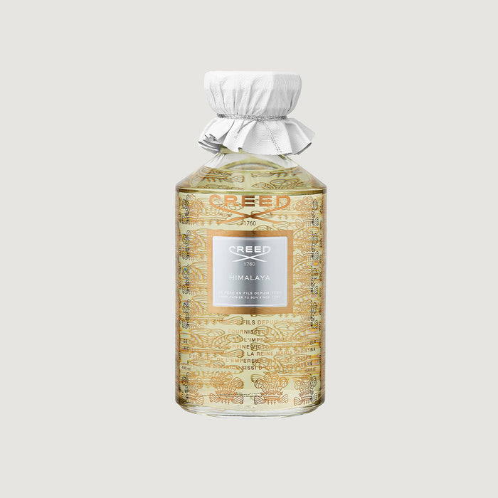 Creed Himalaya 490ml Grand Flacon with Gold Heritage Print and White Leather Cap - Front View | Creed Fragrances