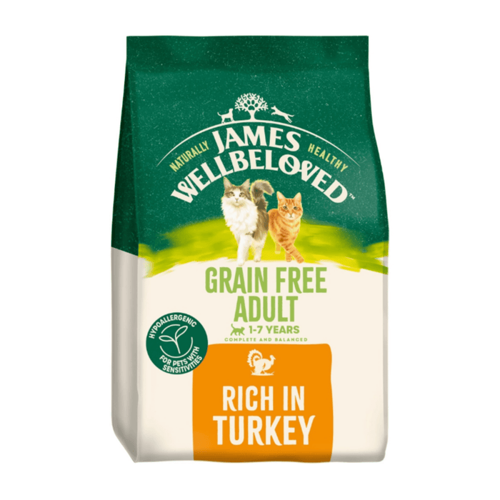 White background with a bag of James Wellbeloved Grain Free Turkey cat food. Packaging is green and cream with 2 cats pictured, with text 'Grain Free Adult, 1-7years, Rich in Turkey'.