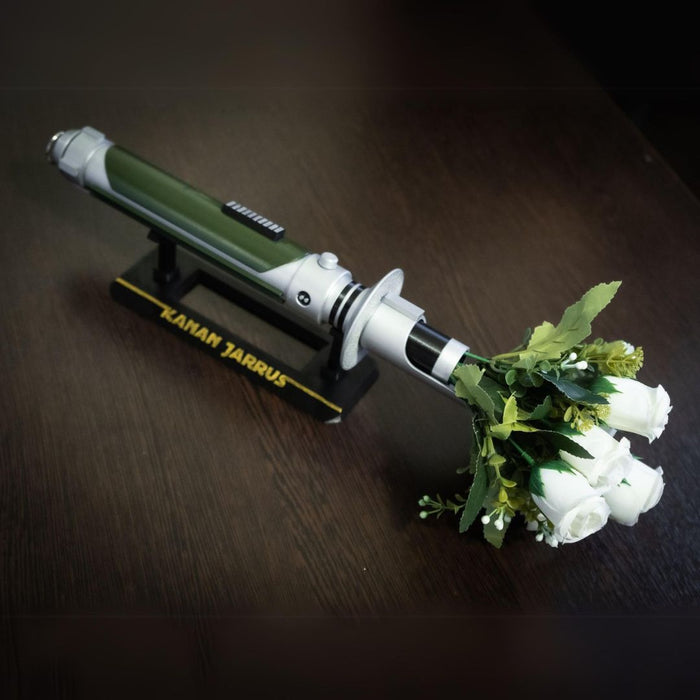 Star Wars inspired bridal bouquet holder shaped like Kanan Jarrus lightsaber with white roses