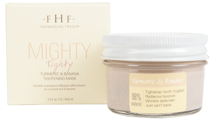 Mighty Tighty® Turmeric & Banana Tightening Mask | Farmhouse Fresh skincare mask in glass jar with white lid next to matching light beige box packaging.