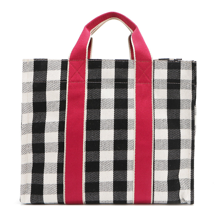 Black gingham back side of the Nodu Nadu Blair Bag – minimalist and structured canvas tote with pink handles. Perfect and spacious for everyday wear with a rectangular silhouette and webbed dual straps.