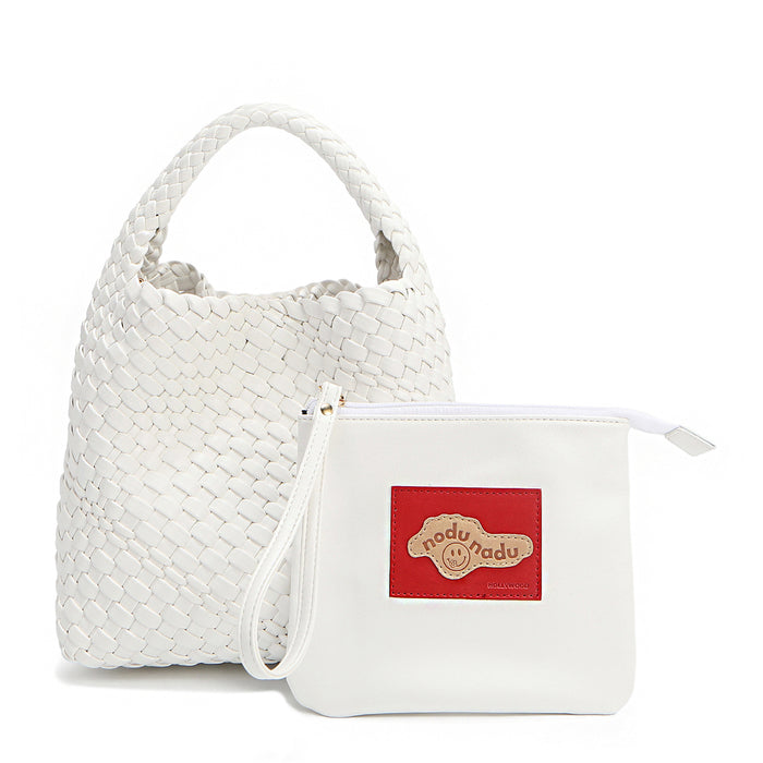 Soft, slouchy, and effortlessly chic—meet Juni from Nodu Nadu by Nicole Lee. Crafted from braided vegan leather, this beauty boasts a relaxed silhouette, a bonus zip pouch inside, and an optional matching strap. The ultimate go-anywhere, carry-everything statement piece—style it your way, every day! Available in a classic, timeless white shade along with even more versatile and on-trend tones to express your unique style. Each Juni bag comes with its own removable zip pouch in a solid matching c