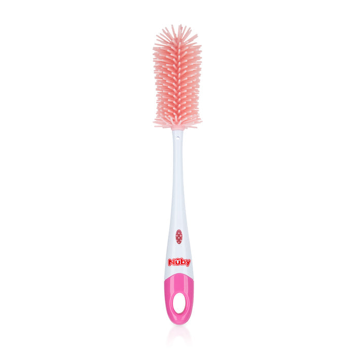 The Non-Scratch Silicone Bristle Bottle has pink and white silicone bristles, an ergonomic handle, and a nipple brush, making it ideal for cleaning baby bottles.