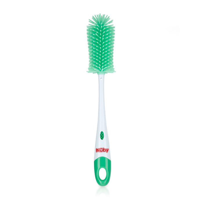 The Non-Scratch Silicone Bristle Bottle brush has green and white silicone bristles, a textured head, handle with a red Nuby logo, and a hanging hole. Perfect for cleaning bottles and nipples without scratching.