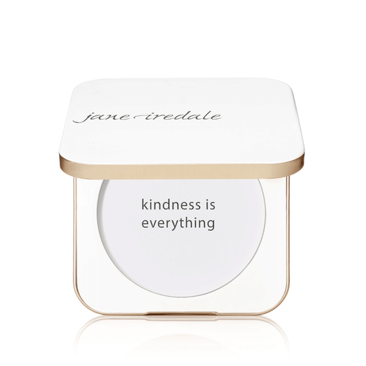 Refillable Compact | Jane Iredale in white and gold with the phrase "kindness is everything" inside the compact, showcasing a sleek, minimalist design for skincare or beauty use.