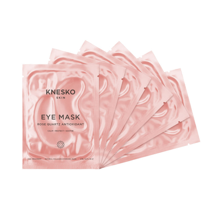 Six individually packaged Rose Quartz Antioxidant Eye Mask - 6 Pack | Knesko in soft pink sachets designed for skincare and soothing eye treatment.