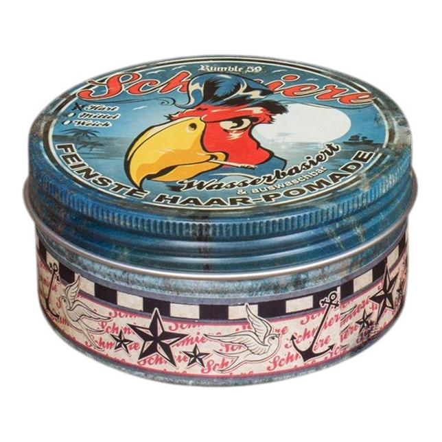 Lukket metallboks med Schmiere Rumble 59 vannbasert hårpomade