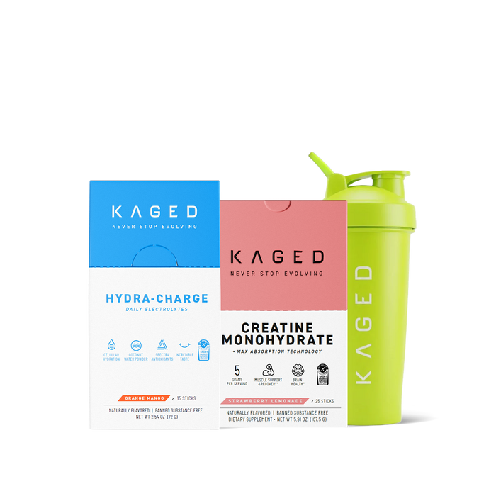 Starter Stack with Hydra-Charge electrolyte and Creatine Monohydrate boxes and lime Kaged shaker on white background