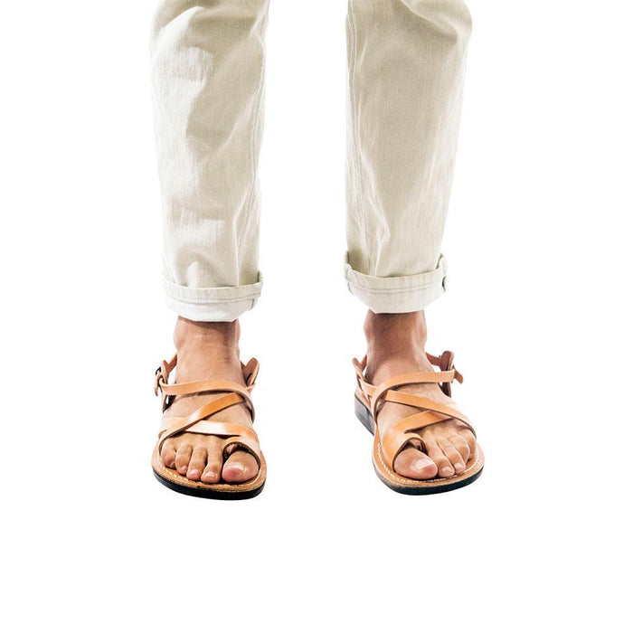 Model wearing The Good Shepherd Buckle tan, handmade leather sandals with back strap and toe loop