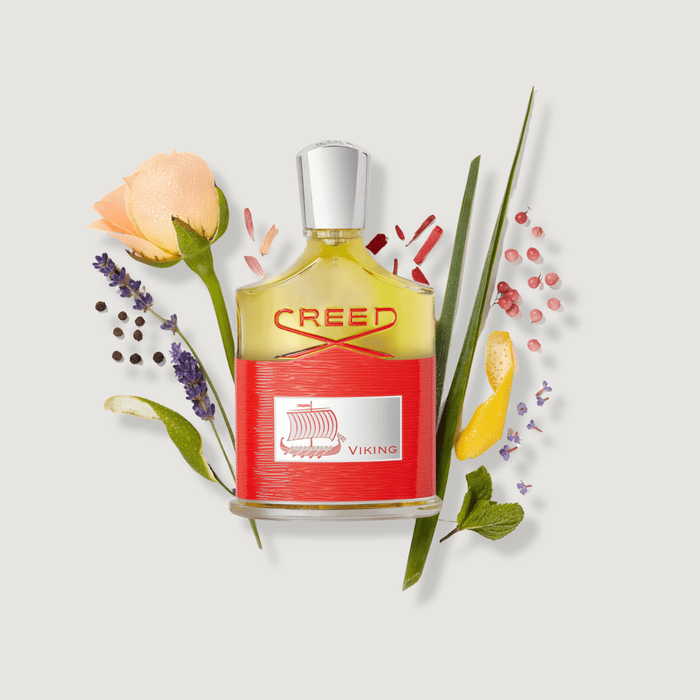 Red Glass Viking Eau de Parfum Bottle - Ingredient Flat Lay with Rose, Lavender & Citrus | Creed Fragrances