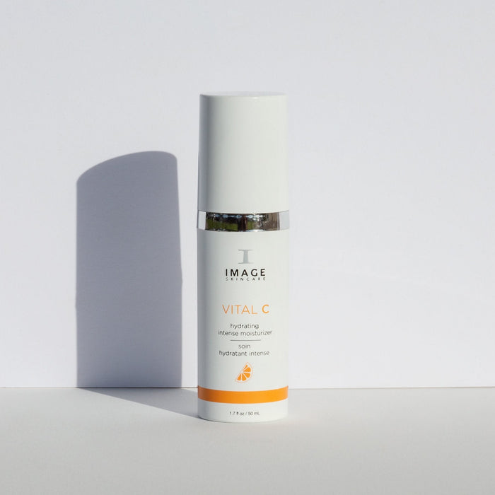 VITAL C hydrating intense moisturizer | IMAGE Skincare bottle standing against a plain white background with subtle shadow, showcasing clean skincare product design.